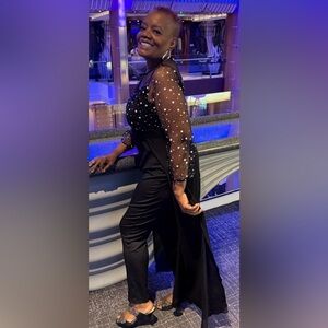 Elegant Black Jumpsuit with Sheer Polka Dot Sleeves